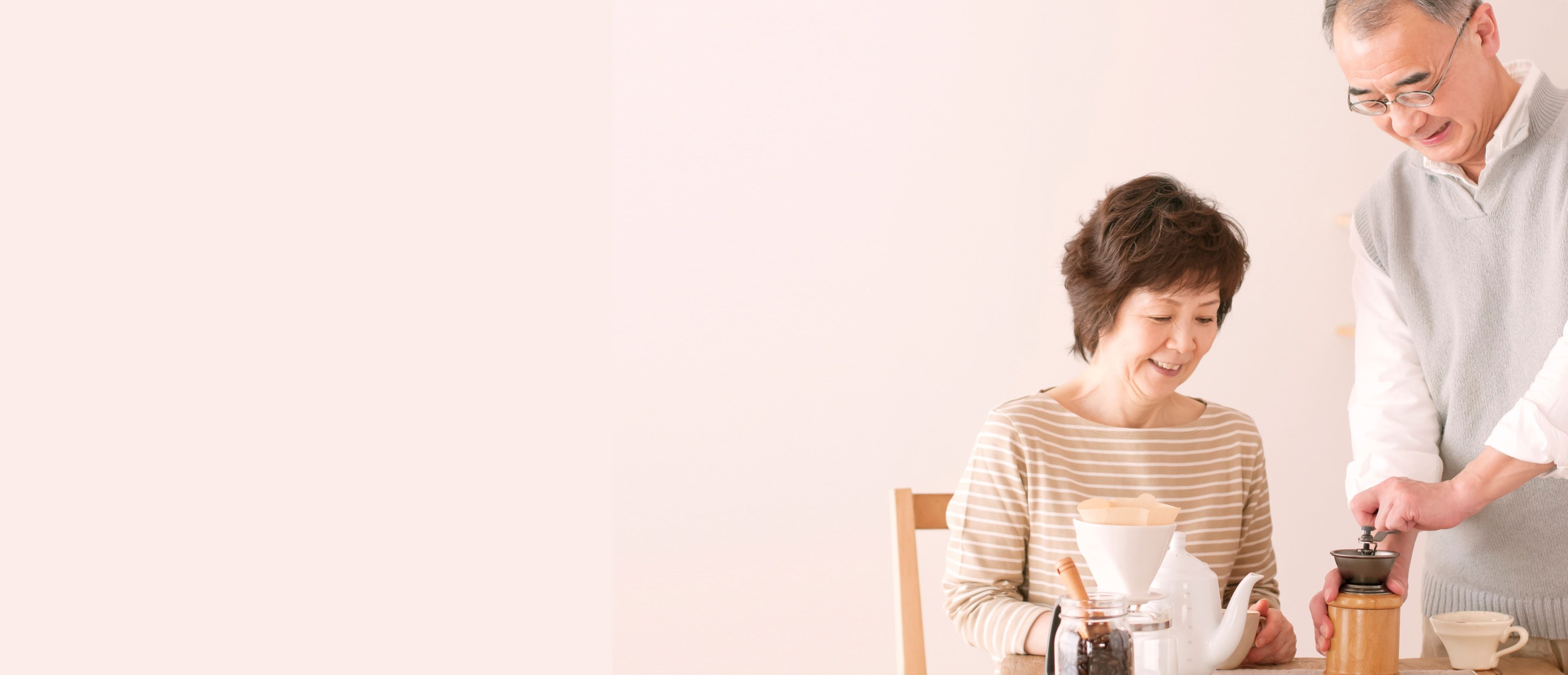 a midle age couple enjoys coffee making