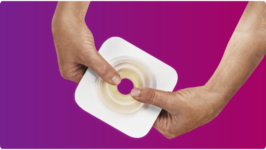 hands holding a skin barrier