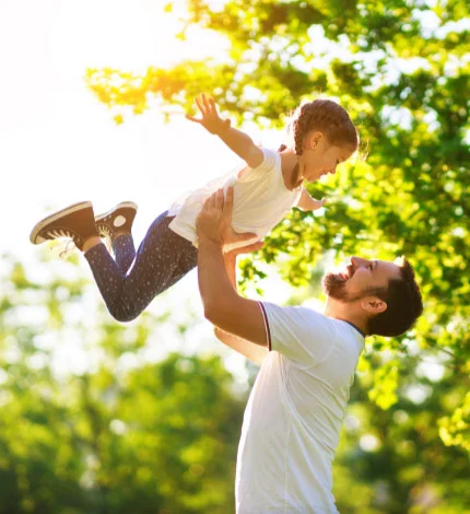 a man and a woman jumping in the air