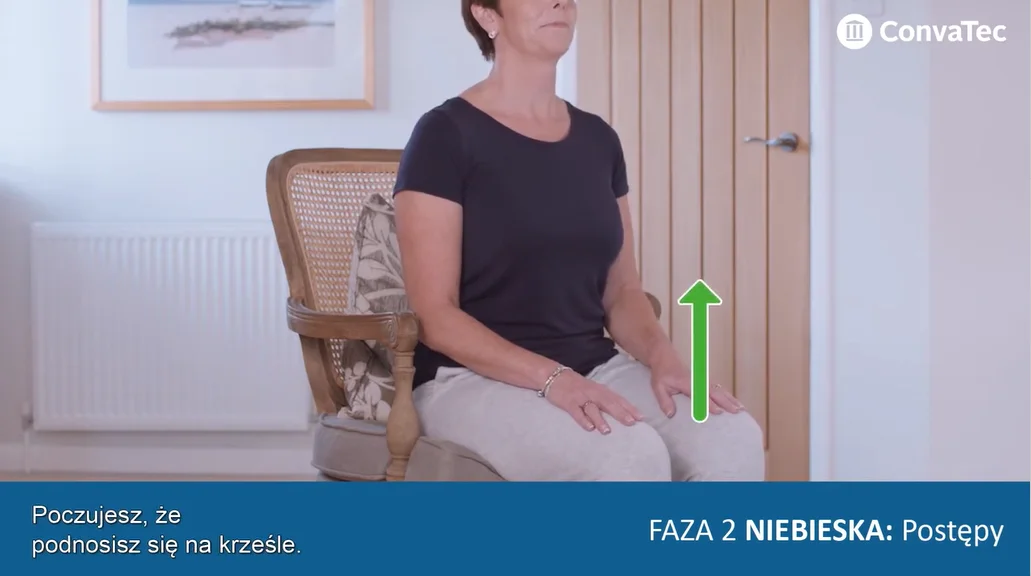 osoba siedząca na krześle